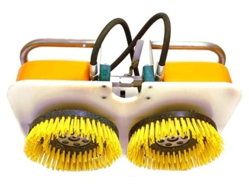 Underwater twin brush cleaning machine