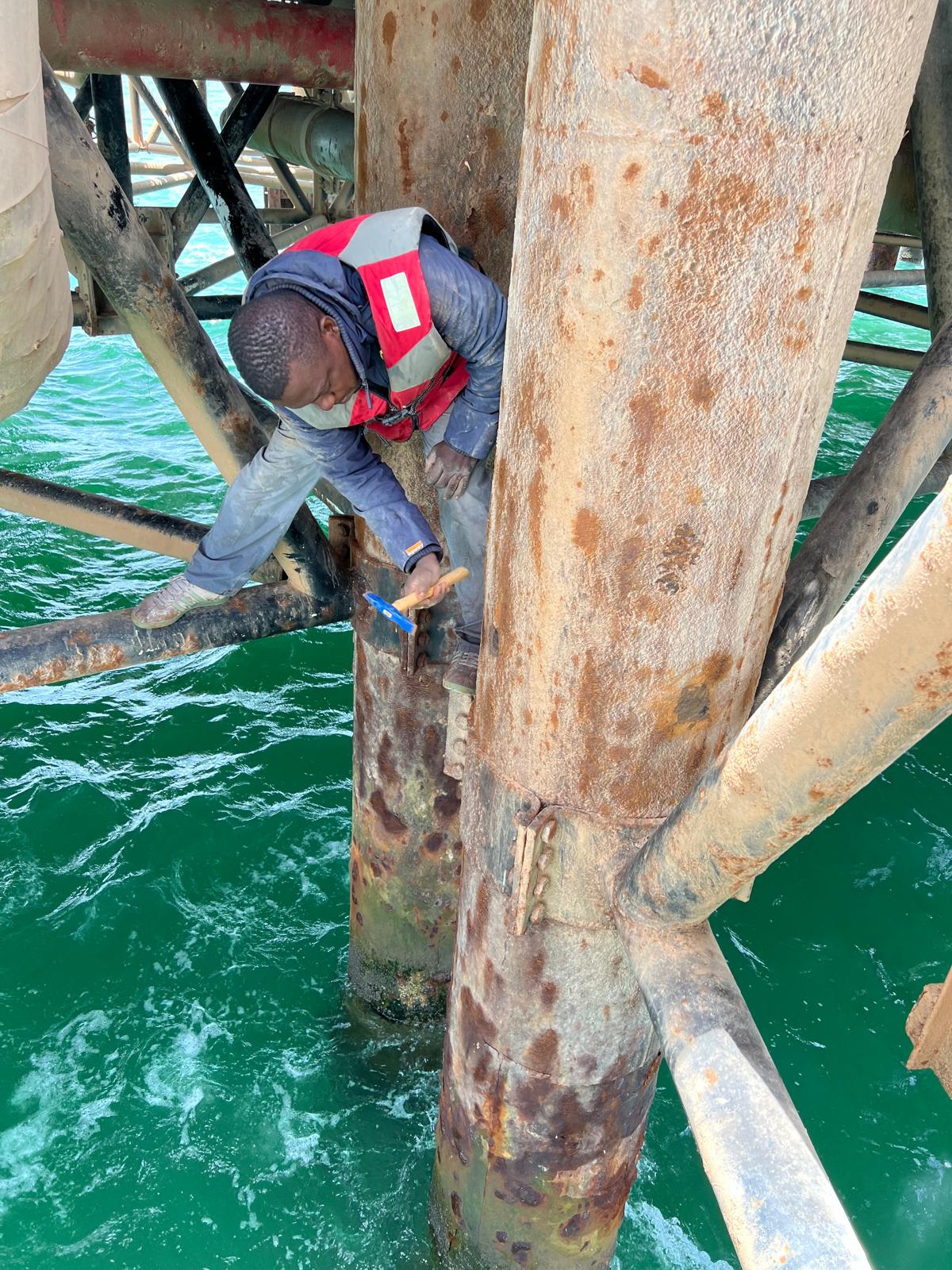 Underwater gusset plate installation